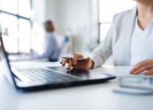 property manager working from the office with laptop on the desk